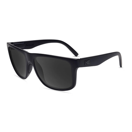 https://cdn.shopify.com/s/files/1/1356/7869/files/affordable-sport-sunglasses-black-on-black-torrey-pines-flyover.jpg?v=1775848521