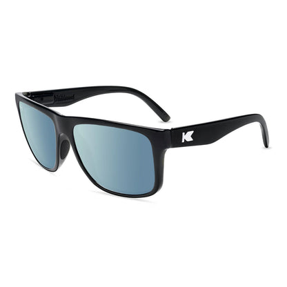 https://cdn.shopify.com/s/files/1/1356/7869/files/affordable-sport-sunglasses-black-sky-blue-torrey-pines-flyover_b34ec43a-c64d-412b-9ada-596571f33a0a.jpg?v=1775848521