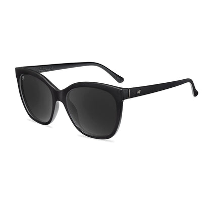 https://cdn.shopify.com/s/files/1/1356/7869/files/affordable-sunglasses-black-on-black-deja-views-flyover_2.jpg?v=1775684364